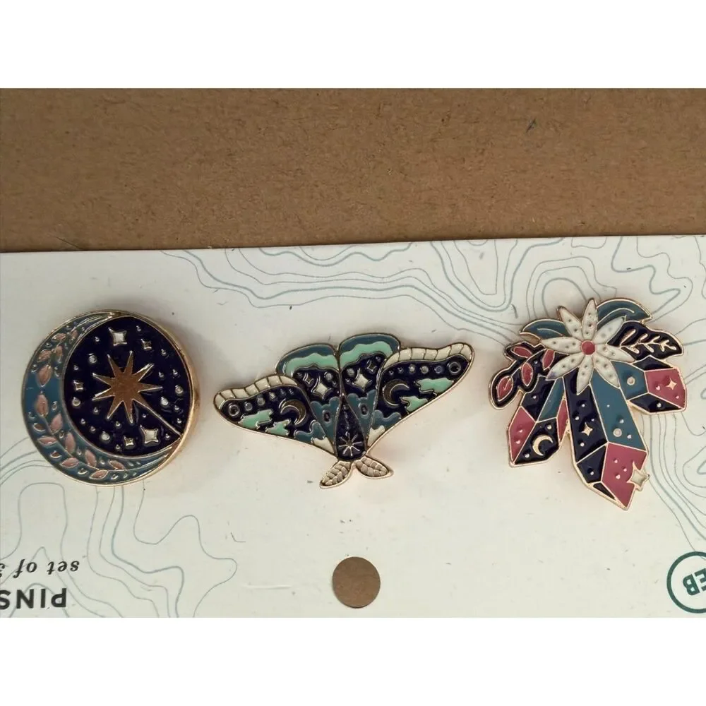 Set of 3 enamel pins featuring moth, crystal and celestial design